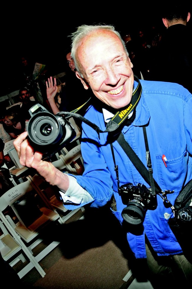 Photographer Bill Cunningham attends Christian Siriano's spring 2010 runway show at Bryant Park Promenade.